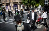 Ultra-Orthodox Jews in the Jerusalem neighborhood of Mea Shearim on October 2, 2020. (Yonatan Sindel/Flash90)