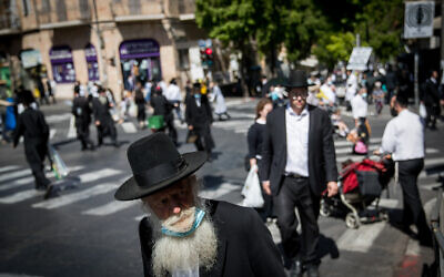 Ultra-Orthodox Jews in the Jerusalem neighborhood of Mea Shearim on October 2, 2020. (Yonatan Sindel/Flash90)