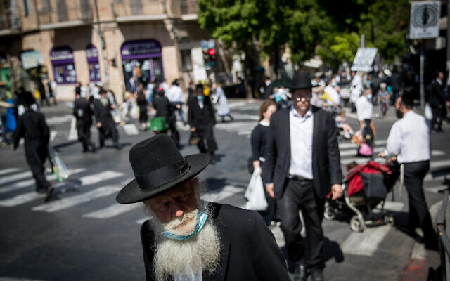 Ultra-Orthodox Jews in the Jerusalem neighborhood of Mea Shearim on October 2, 2020. (Yonatan Sindel/Flash90) Ultra-Orthodox Jews in the Jerusalem neighborhood of Mea Shearim on October 2, 2020. (Yonatan Sindel/Flash90)