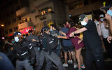 Israelis protest against Israeli prime minister Benjamin Netanyahu at Habima Square in Tel Aviv on October 3, 2020. (Miriam Alster/Flash90)