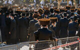Ultra-Orthodox Jews attend the funeral of Pittsburgh Rebbe Mordechai Leifer in the city of Ashdod on October 5, 2020. (Photo by Flash90)