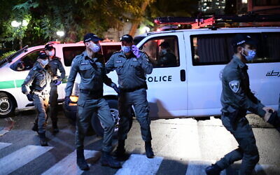 Illustrative: Police at a march in Tel Aviv against Prime Minister Benjamin Netanyahu on October 6, 2020. (Tomer Neuberg/Flash90)