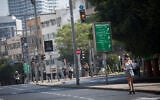 An empty road in Tel Aviv on October 8, 2020, during a nationwide coronavirus lockdown. (Miriam Alster/Flash90)