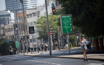 An empty road in Tel Aviv on October 8, 2020, during a nationwide coronavirus lockdown. (Miriam Alster/Flash90)