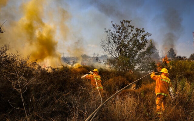 Firemen fight flames near the Kfar HaOranim settlemet in the West Bank, October 9, 2020 (Yossi Aloni/Flash90)