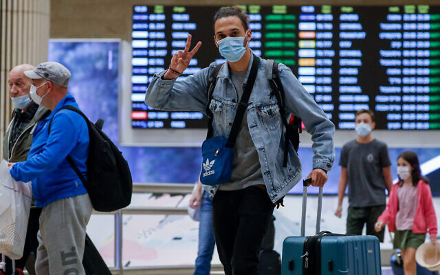Travelers at the almost empty halls of Ben Gurion International Airport, during a nationwide lockdown, October 12, 2020. (Olivier Fitoussi/FLASH90) Travelers at the almost empty halls of Ben Gurion International Airport, during a nationwide lockdown, October 12, 2020. (Olivier Fitoussi/FLASH90)