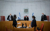 Illustrative -- Supreme Court Chief Justice Esther Hayut (C) arrives for a discussion on a petition against the coronavirus restrictions on demonstrations in Jerusalem, on October 13, 2020 (Yonatan Sindel/Flash90)