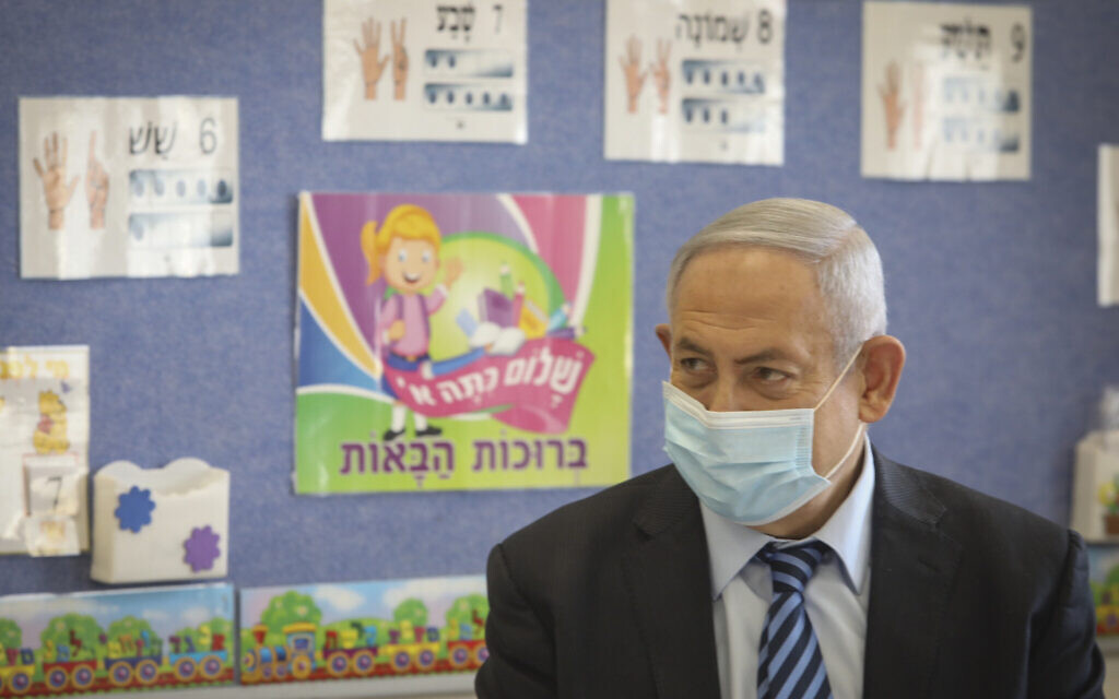 Prime Minister Benjamin Netanyahu visits Israeli kids on the first day of the school year in Mevo Horon on September 1, 2020. (Marc Israel Sellem/Pool) Prime Minister Benjamin Netanyahu visits Israeli kids on the first day of the school year in Mevo Horon on September 1, 2020. (Marc Israel Sellem/Pool)