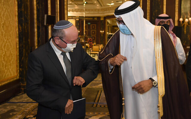 Bahraini Foreign Minister Abdullatif bin Rashid al-Zayani amd Israeli National Security Advisor Meir Ben Shabbat, at the signing ceremony of a peace agreement between Israel and Bahrain, in Manama, October 18, 2020. (Haim Zach / GPO) Bahraini Foreign Minister Abdullatif bin Rashid al-Zayani amd Israeli National Security Advisor Meir Ben Shabbat, at the signing ceremony of a peace agreement between Israel and Bahrain, in Manama, October 18, 2020. (Haim Zach / GPO)