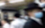 Screen capture from video of police breaking up a gathering in Kiryat Gat. Video blurred to protect identities. (Channel 12)