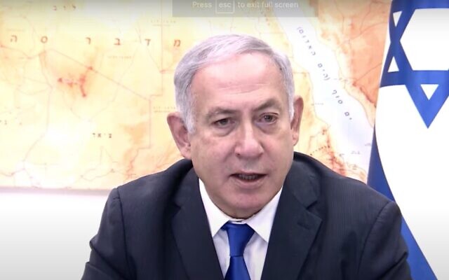 Screen capture from video of Prime Minister Benjamin Netanyahu at the start of the weekly cabinet meeting, October 18, 2020. (YouTube) Screen capture from video of Prime Minister Benjamin Netanyahu at the start of the weekly cabinet meeting, October 18, 2020. (YouTube)