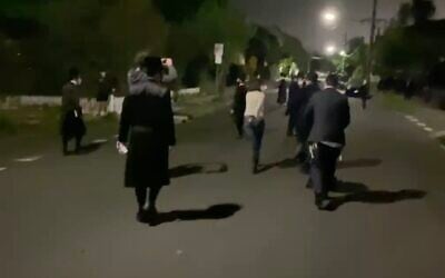 A group of ultra-Orthodox Jews is seen in Melbourne, Australia, on October 10, 2020. (Screen capture: Twitter)
