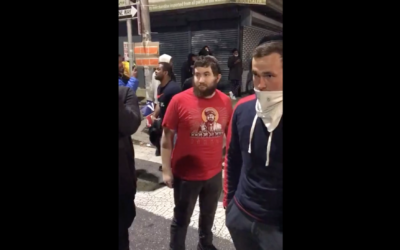 A screen shot from a video of an incident in Philadelphia in which visibly Jewish men at a Black Lives Matter protest were shoved and told to leave, October 27, 2020. (Screenshot from Instagram via JTA)