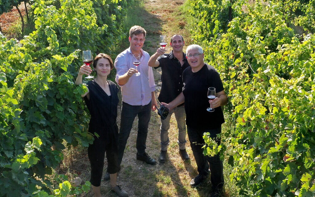 Wine experts Roni Saslove (left) and Guy Haran (second from left) partnered with graphic design artist Itamar Gur and photographer David Silverman (right) to create 'Wine Journey,' a guide to Israeli wineries (Courtesy Wine Journey) Wine experts Roni Saslove (left) and Guy Haran (second from left) partnered with graphic design artist Itamar Gur and photographer David Silverman (right) to create 'Wine Journey,' a guide to Israeli wineries (Courtesy Wine Journey)