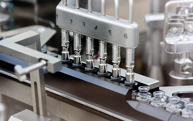 Rubber stoppers are placed onto filled vials of the drug remdesivir at a Gilead manufacturing site in the United States, March 2020. (Gilead Sciences via AP) Rubber stoppers are placed onto filled vials of the drug remdesivir at a Gilead manufacturing site in the United States, March 2020. (Gilead Sciences via AP)