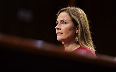 US Supreme Court nominee Amy Coney Barrett listens during a confirmation hearing before the Senate Judiciary Committee on Capitol Hill in Washington, October 13, 2020. (Stefani Reynolds/Pool via AP)