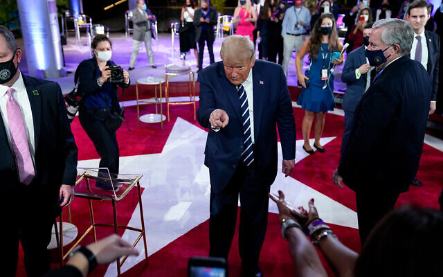 US President Donald Trump leaves after an NBC News Town Hall in Miami, Oct. 15, 2020. (AP Photo/Evan Vucci)