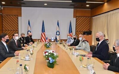 Defense Minister Benny Gantz, right, and senior Israeli defense officials meet with  US Secretary of Defense Mark Esper, left and his staff at military headquarters in Tel Aviv on October 29, 2020. (Ariel Hermoni/Defense Ministry)
