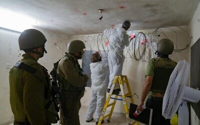 IDF troops seal off room of a Palestinian man suspected of killing a soldier earlier this year, in the town of Yabed on October 21, 2020. (Israel Defense Forces)