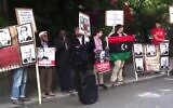 Manchester bomber Salman Abedi (far right, red shirt) attends protest outside the UAE embassy in London, hours after he demonstrated against visit by Prime Minister Benjamin Netanyahu in 2015 (Screen grab/Daily Mail)