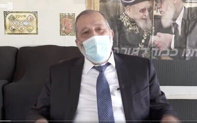 Screen capture from video of Interior Minister Aryeh Deri denying that he had broken coronavirus lockdown travel restrictions on Yom Kippur, October 6, 2020. (Twitter)