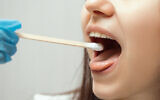 A throat swab for a coronavirus test. (Galina Sandalova via iStock by Getty Images)