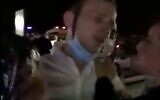 A groom is seen at a wedding at the Dead Sea, after police were called to disperse some of the guests to maintain health regulations, October 21, 2020 (video screenshot)