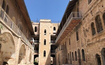The U-shaped courtyard of the former Schneller German Protestant Orphanage, now slated for renovation and rebuilding as Beit Hakehillot museum and institute (Jessica Steinberg/Times of Israel)