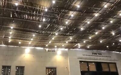 A giant sukkah presumably for mass gatherings is prepared in the ultra-Orthodox neighborhood of Mea Shearim despite rocketing virus rates, September 30, 2020 (Screen grab/Ynet)