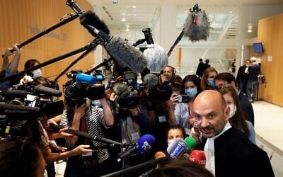 In this file photo taken on September 9, 2020, Charlie Hebdo's  lawyer Richard Malka   talks to the press at the "Tribunal de Paris" courthouse in Paris,  during the trial of 14 people suspected of being accomplices in the Charlie Hebdo and Hyper Cacher jihadist killings. (GEOFFROY VAN DER HASSELT / AFP)