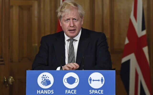 Britain's Prime Minister Boris Johnson speaks during a virtual press conference inside 10 Downing Street in central London on October 31, 2020 to announce new lockdown restrictions in an effort to curb rising infections of the novel coronavirus. (Alberto Pezzali / POOL / AFP) Britain's Prime Minister Boris Johnson speaks during a virtual press conference inside 10 Downing Street in central London on October 31, 2020 to announce new lockdown restrictions in an effort to curb rising infections of the novel coronavirus. (Alberto Pezzali / POOL / AFP)