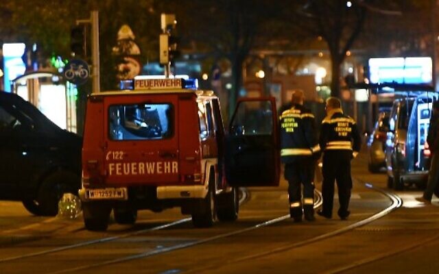 Firefighters and police cars stand near Schwedenplatz square following a shooting in the center of Vienna on November 2, 2020. (Joe Klamar / AFP) Firefighters and police cars stand near Schwedenplatz square following a shooting in the center of Vienna on November 2, 2020. (Joe Klamar / AFP)