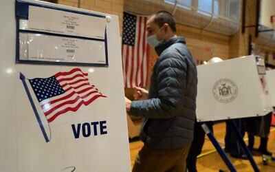 People vote at Public School 33 in New York City on US Election Day, November 3, 2020. (Bryan R. Smith / AFP)