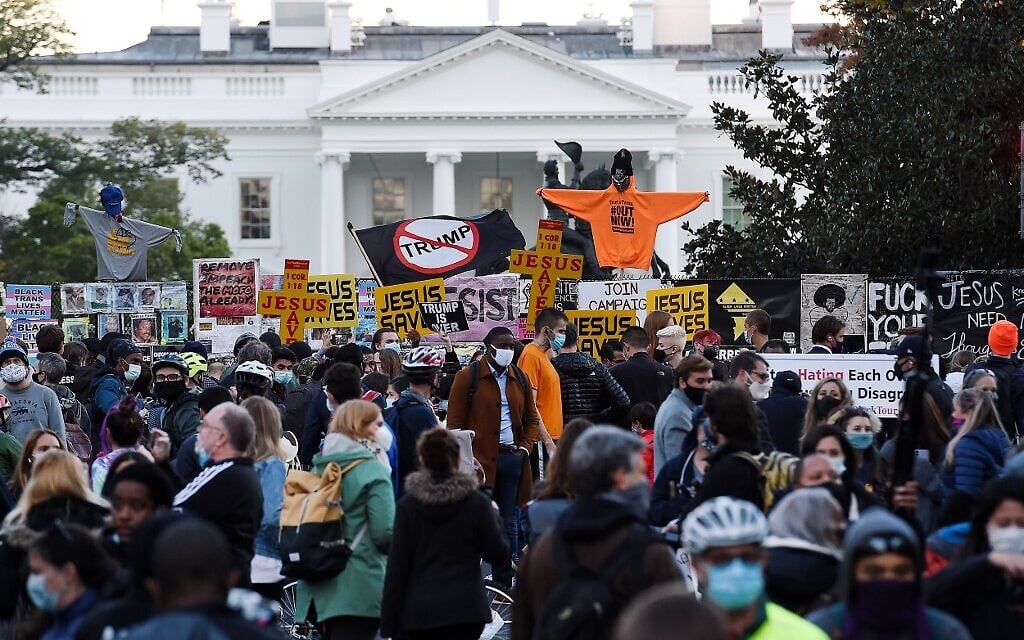 Demonstrators rally at Black Lives Matter plaza across from the White House in Washington, DC, on election day, November 3, 2020. (Olivier Douliery/AFP)
