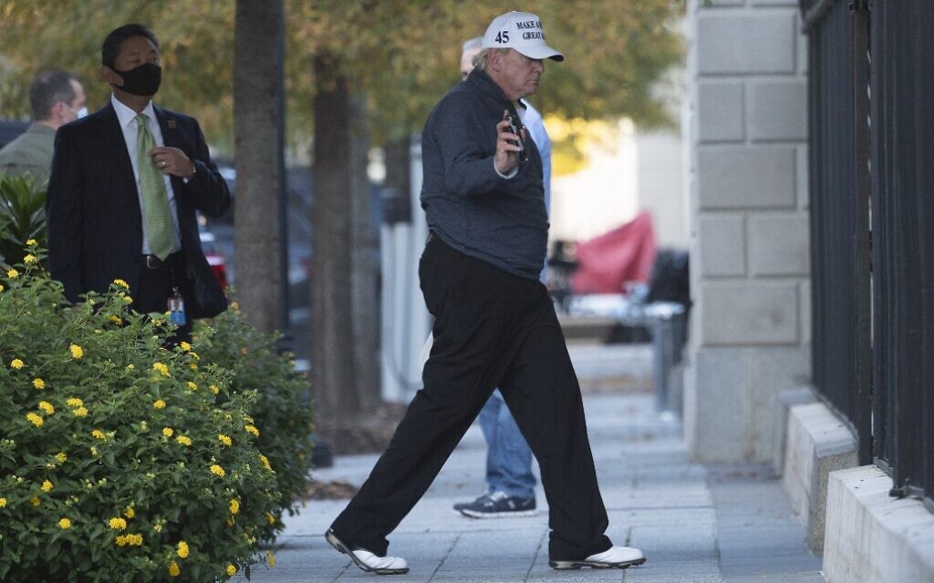 US President Donald Trump returns to the White House in Washington from playing golf on November 7, 2020, after Joe Biden was declared the winner of the 2020 presidential election. (Andrew Caballero-Reynolds/AFP)