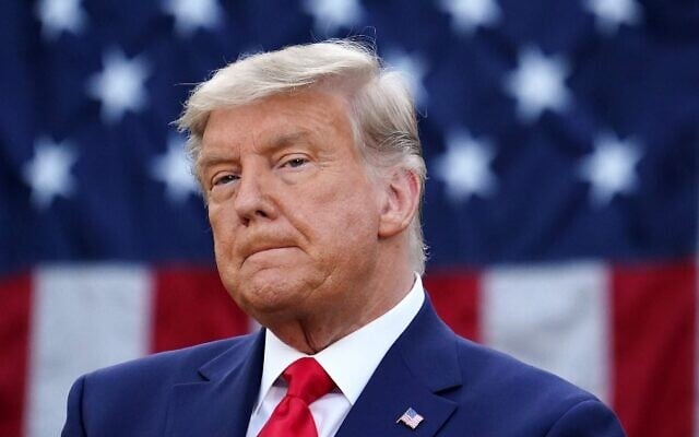 US President Donald Trump looks on after delivering an update on 'Operation Warp Speed' in the Rose Garden of the White House in Washington on November 13, 2020. (Mandel Ngan/AFP) US President Donald Trump looks on after delivering an update on 'Operation Warp Speed' in the Rose Garden of the White House in Washington on November 13, 2020. (Mandel Ngan/AFP)