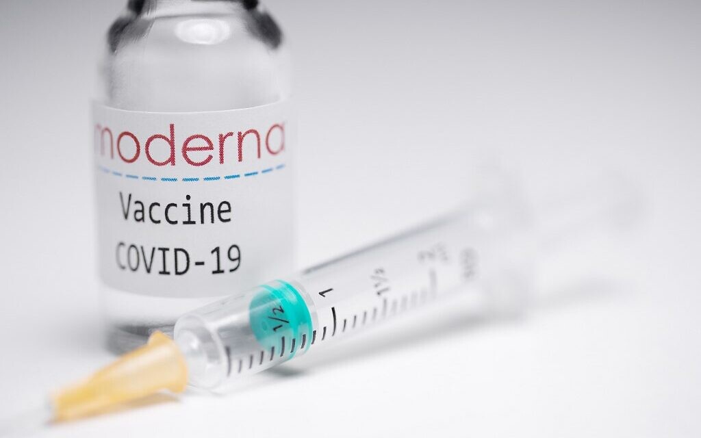 A syringe and a vial with the logo of US biotech firm Moderna. (AFP) A syringe and a vial with the logo of US biotech firm Moderna. (AFP)