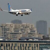 An airplane of budget airline Flydubai lands at Israel's Ben Gurion airport near Tel Aviv on November 26, 2020, on the first scheduled commercial service between the two cities, following the normalization of ties between the UAE and Israel. (JACK GUEZ / AFP)