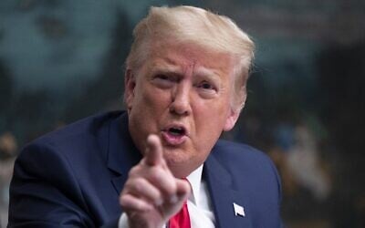 US President Donald Trump speaks to reporters after participating in a Thanksgiving teleconference with members of the United States Military, at the White House in Washington on November 26, 2020. (Andrew Caballero-Reynolds/AFP)