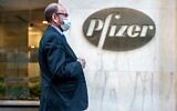People walk by the Pfizer headquarters on November 9, 2020, in New York City. (David Dee Delgado/Getty Images/AFP)