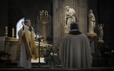 Priest Henri de La Hougue, left, celebrates the All Saints Day mass in Saint-Sulpice church, in Paris, France, November 1, 2020. (Thibault Camus/AP)