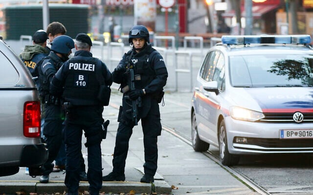After a shooting incident, armed police move into position at the scene in Vienna, Austria, November 3, 2020. (Ronald Zak/AP) After a shooting incident, armed police move into position at the scene in Vienna, Austria, November 3, 2020. (Ronald Zak/AP)