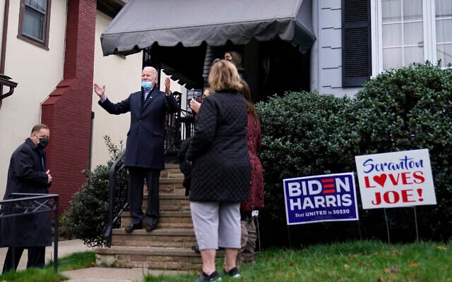 Democratic US presidential candidate Joe Biden waves while visiting his boyhood home during a stop in Scranton, Pennsylvania, November 3, 2020. (AP Photo/Carolyn Kaster) Democratic US presidential candidate Joe Biden waves while visiting his boyhood home during a stop in Scranton, Pennsylvania, November 3, 2020. (AP Photo/Carolyn Kaster)