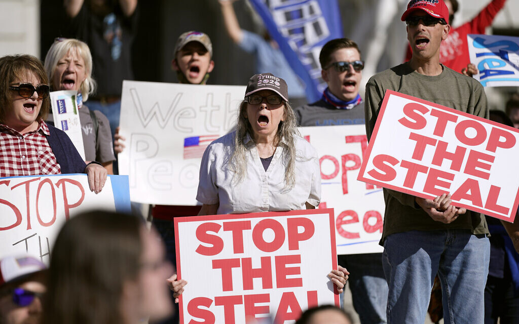 People demonstrate outside the Pennsylvania State Capitol on November 6, 2020, in Harrisburg, Pennsylvania, as vote counting continues following the US presidential elections. (AP Photo/Julio Cortez) People demonstrate outside the Pennsylvania State Capitol on November 6, 2020, in Harrisburg, Pennsylvania, as vote counting continues following the US presidential elections. (AP Photo/Julio Cortez)