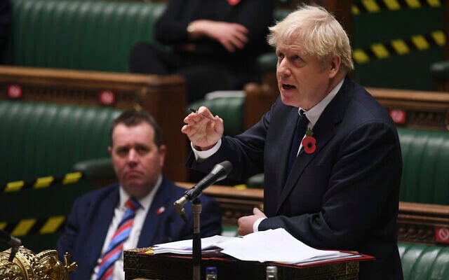 In this handout photo provided by UK Parliament, Britain's Prime Minister Boris Johnson speaks during Prime Minister's Questions in the House of Commons in London, Wednesday, Nov. 11, 2020. (Jessica Taylor/UK Parliament via AP) In this handout photo provided by UK Parliament, Britain's Prime Minister Boris Johnson speaks during Prime Minister's Questions in the House of Commons in London, Wednesday, Nov. 11, 2020. (Jessica Taylor/UK Parliament via AP)