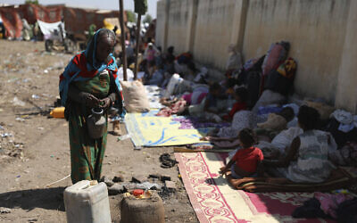 Refugees from the Tigray region of Ethiopia arrive at Hamdayet, Sudan on Saturday, November 14, 2020. (AP Photo/Marwan Ali)