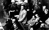Hermann Goering stands in the prisoner's dock at the Nuremberg War Crimes Trial in Germany, November 21, 1945. (AP Photo, file)