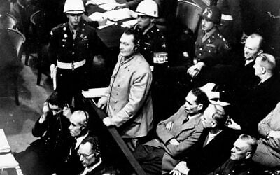 Hermann Goering stands in the prisoner's dock at the Nuremberg War Crimes Trial in Germany, November 21, 1945. (AP Photo, file)