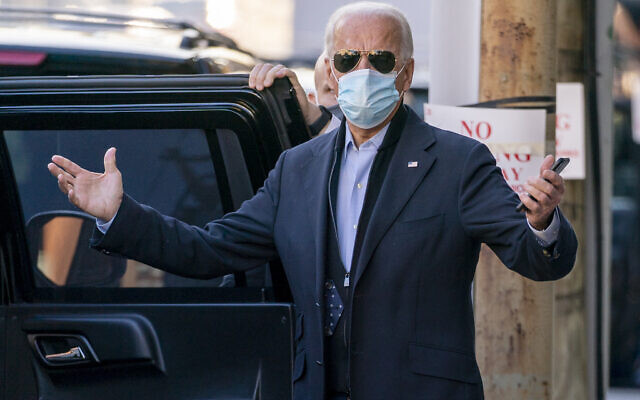 US President-elect Joe Biden speaks to reporters as he leaves The Queen theater on November 18, 2020, in Wilmington, Delaware (AP/Andrew Harnik) US President-elect Joe Biden speaks to reporters as he leaves The Queen theater on November 18, 2020, in Wilmington, Delaware (AP/Andrew Harnik)