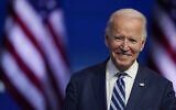 In this November 10, 2020 photo, US President-elect Joe Biden smiles as he speaks at The Queen theater in Wilmington, Delaware (AP Photo/Carolyn Kaster, File)